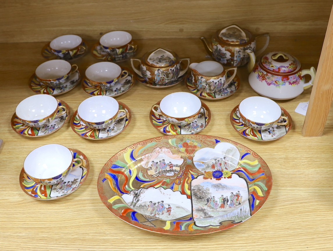 A Japanese Kutani porcelain teaset for 10 and a Japanese floral teapot